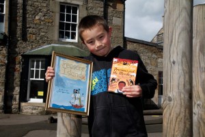 Ben Lewis with his cover design