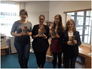  photo of students and books