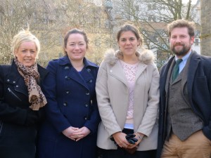 The Alban Books Edinburgh-based team L-R: Margaret Reid (Administrator and marketing Assistant); Elaine Reid (Marketing Manager); Nadia Suchdev (Sales & Marketing Assistant), Jonny Gallant (Managing Director) with Dean Village in background. Credit: Alban Books.