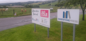 The sign for Sandstone Press 