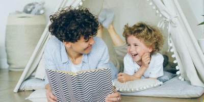 Child being read to by an adult